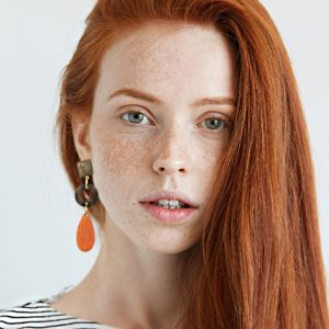 Oranje statement oorbellen roggenleer - Maya